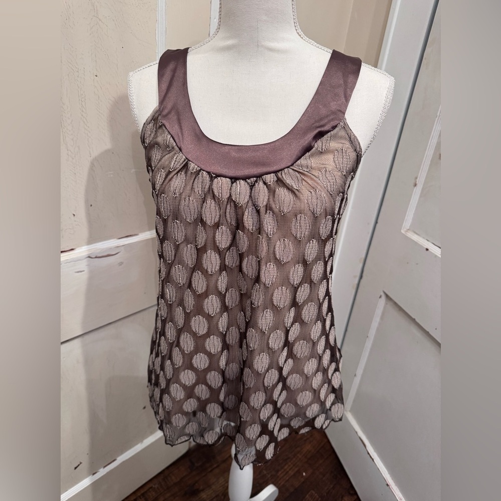 A. Byer tank top blouse. Business attire 
Size Medium 
Bronze Gold coloring